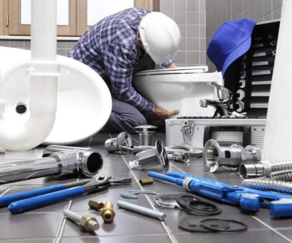 plumber-at-work-in-a-bathroom-1024x683-1